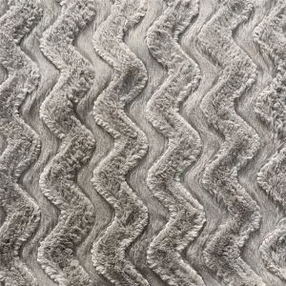 Harjatud kunstkarusnahast kangas